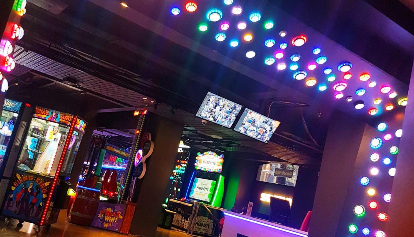 Enter from one of four entrances into one of four rooms of games.